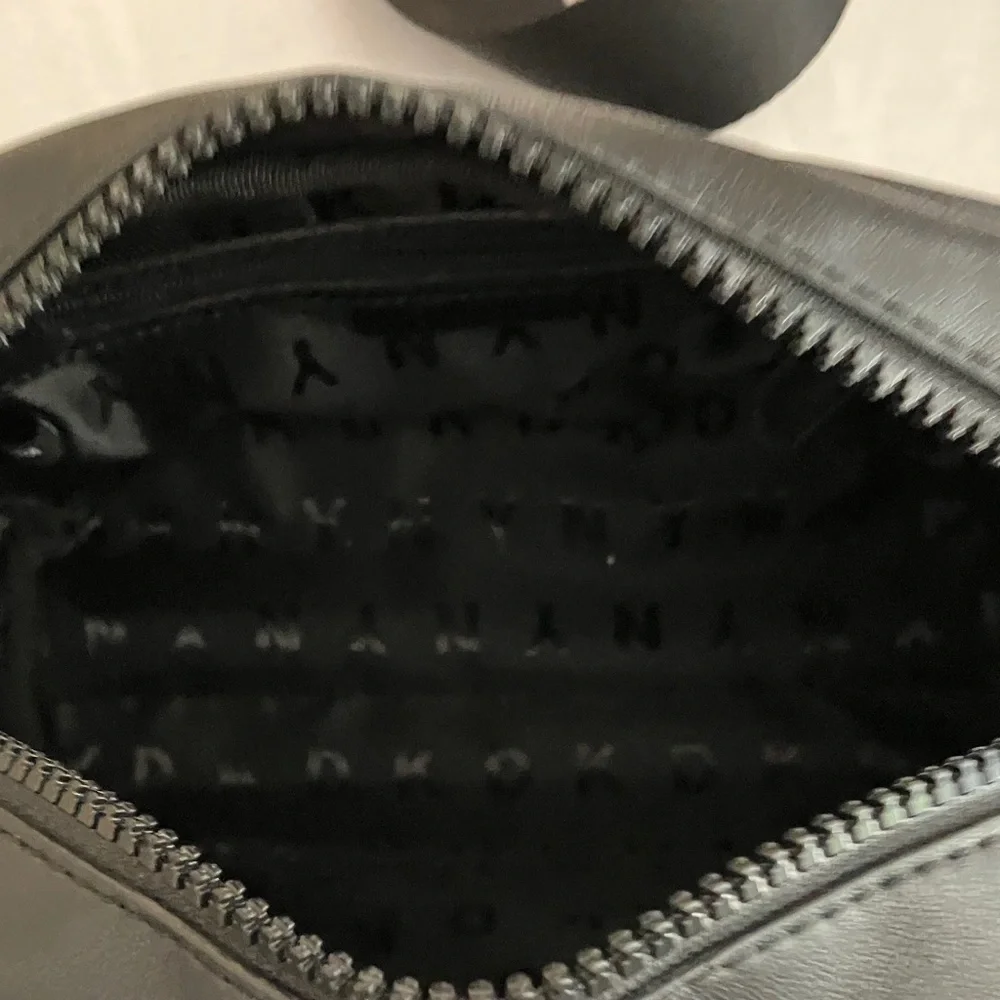 Dkny Black Leather Belt Bag with Embossed Logo
